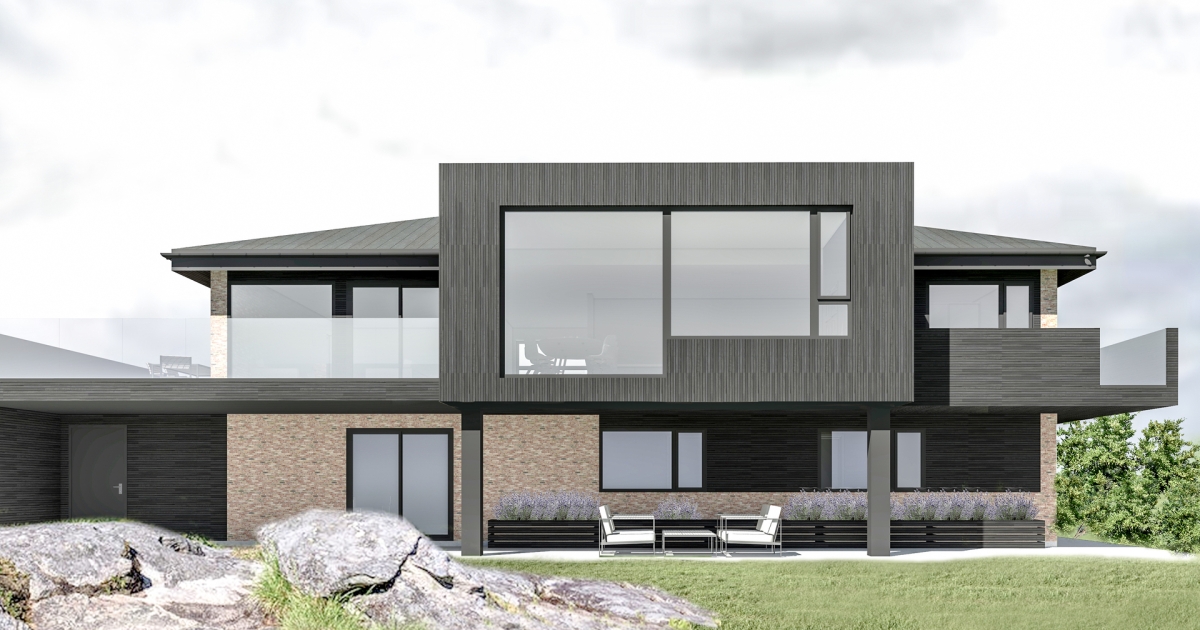 Tilbygg til hus med valmtak og teglstein